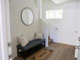 Entry area with adjacent living space and interior access