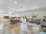 Chefâ€™s kitchen with premium stainless steel appliances and oversized layout.